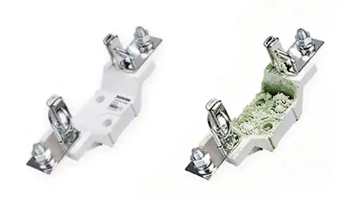 comparison of clean vs corroded DC fuse holder contacts in outdoor PV system